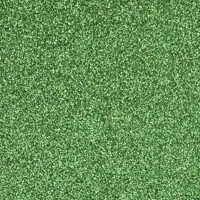 A close-up image of green glitter cardstock with a shimmering texture.