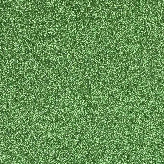 A close-up image of green glitter cardstock with a shimmering texture.