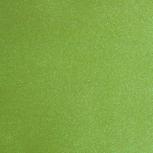 A close-up image of lime green glitter cardstock with a shimmering texture.