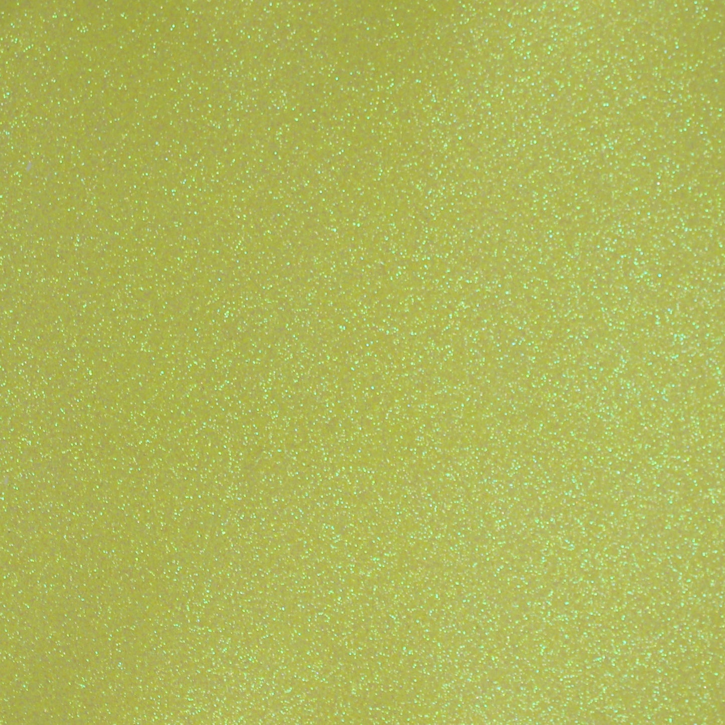 A close-up image of neon yellow glitter cardstock with a shimmering texture.