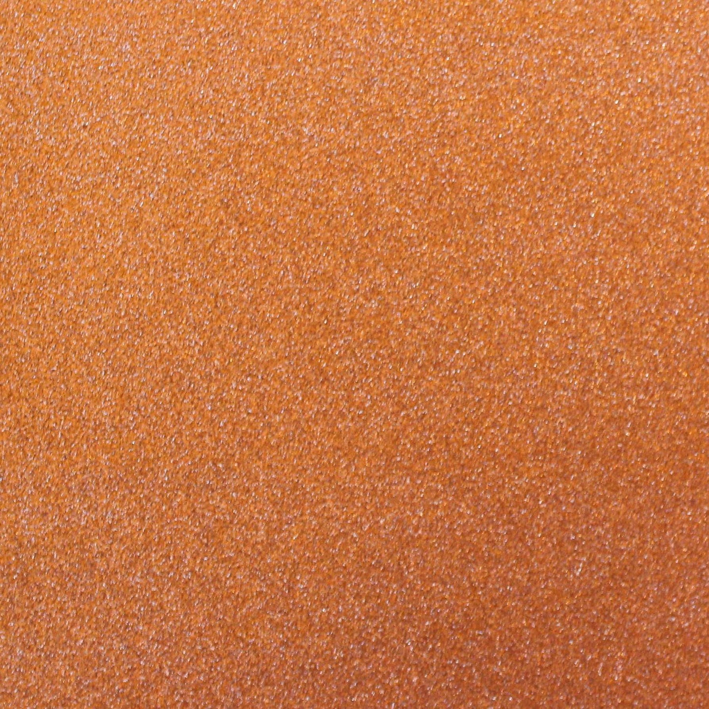 A close-up image of orange glitter cardstock with a non-shedding characteristic, showing the texture and glitter finish.