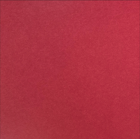 A single sheet of barn red cardstock paper with a smooth finish.