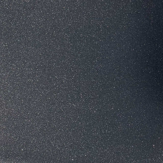 A close-up image of black glitter cardstock with a non-shedding glitter finish.