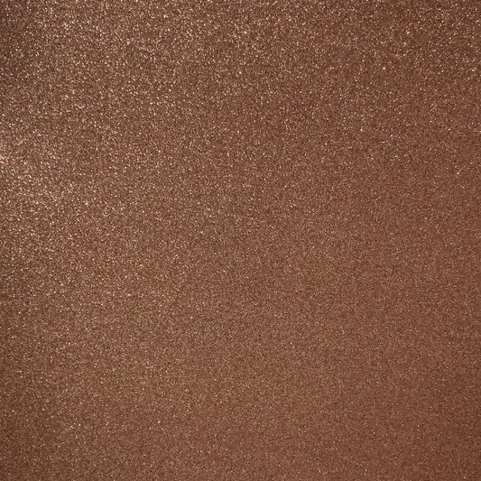 A close-up image of brown glitter cardstock with a shimmering finish.