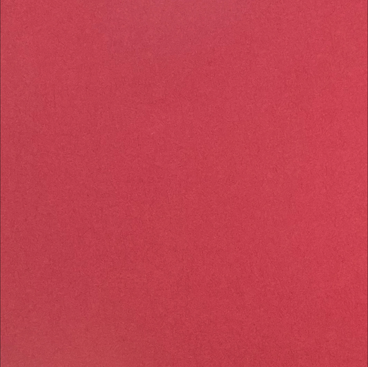 A single sheet of solid burgundy red cardstock paper.