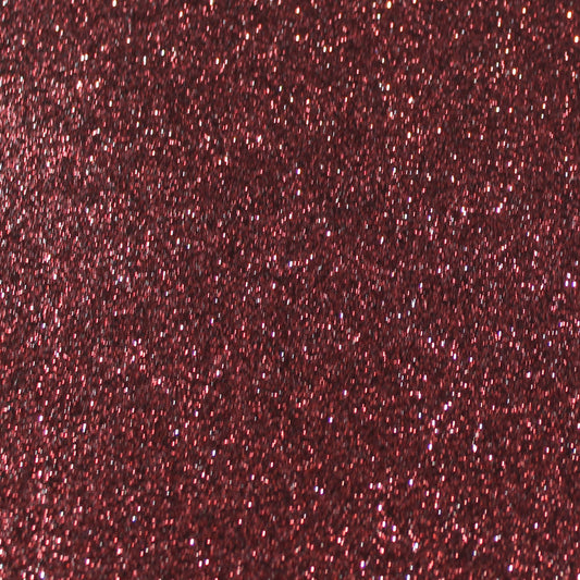 Close-up of dark red wine glitter cardstock with a shimmering texture.