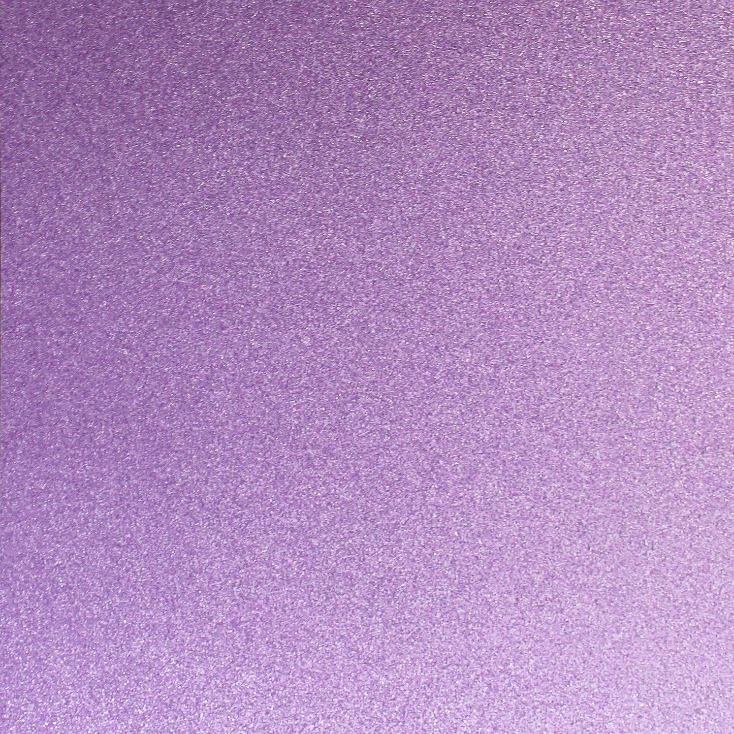 A close-up image of a lavender purple glitter cardstock paper.