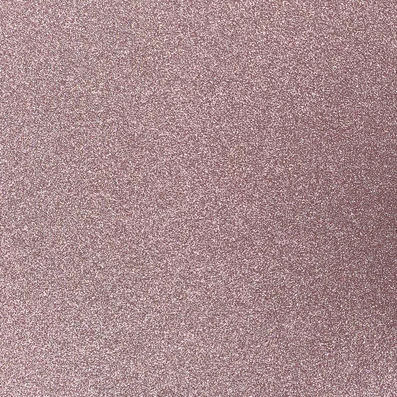 A close-up image of a light pink glitter cardstock with a non-shedding glitter finish.