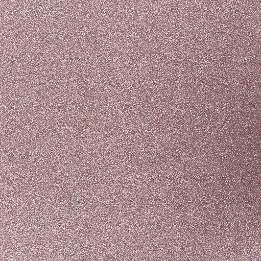 A close-up image of a light pink glitter cardstock with a non-shedding glitter finish.