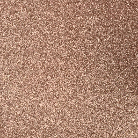 Close-up of peach orange glitter cardstock with a shimmering texture.