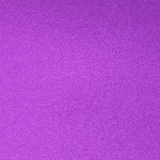 A close-up image of a purple glitter cardstock paper.
