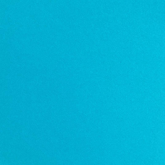 A single sheet of teal blue cardstock paper with a smooth finish.