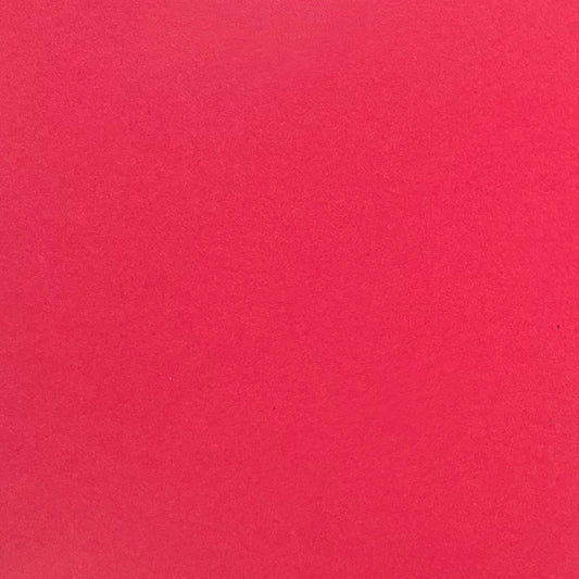 A single sheet of red cardstock paper with a smooth finish.