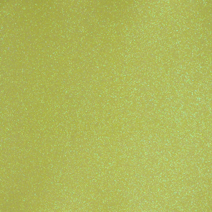 A close-up image of neon yellow glitter cardstock with a shimmering texture.