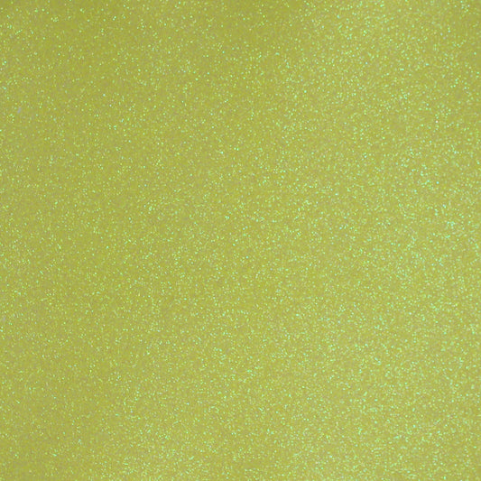 A close-up image of neon yellow glitter cardstock with a shimmering texture.