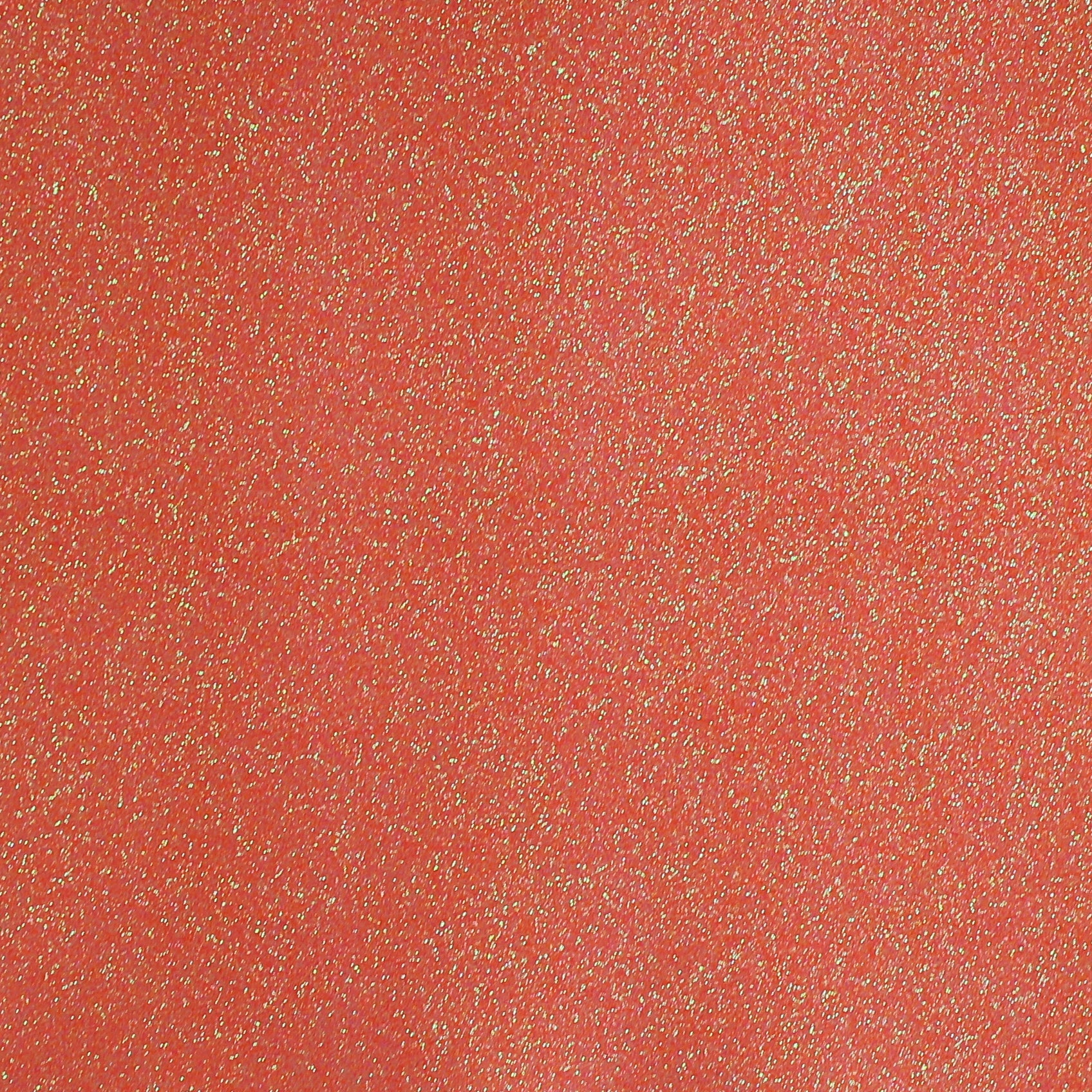 A close-up image of neon orange glitter cardstock with a shimmering texture.