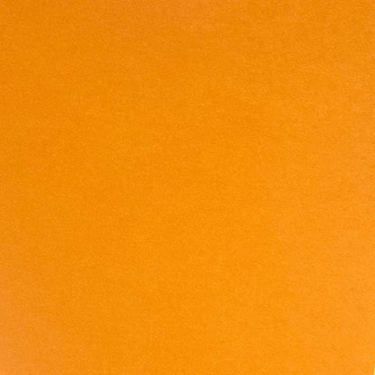 A single sheet of apricot orange cardstock paper.