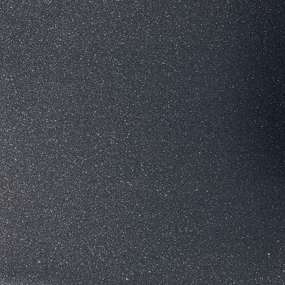 A close-up image of black glitter cardstock with a non-shedding glitter finish.
