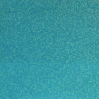 A close-up image of bright blue glitter cardstock with a shimmering texture.
