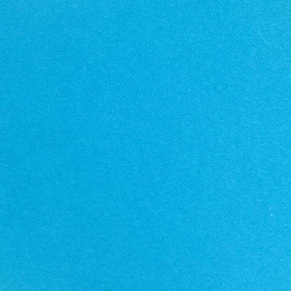A single sheet of cerulean blue cardstock paper with a smooth finish.