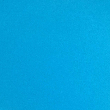 A single sheet of cyan blue cardstock paper with a smooth finish.