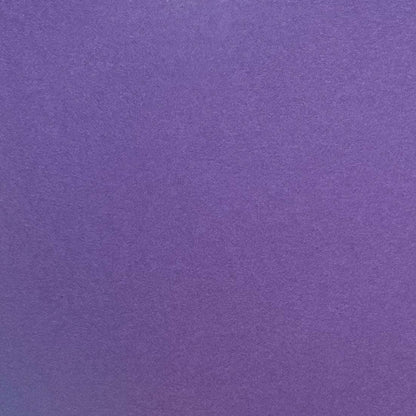 A single sheet of dark purple cardstock paper with a smooth finish.