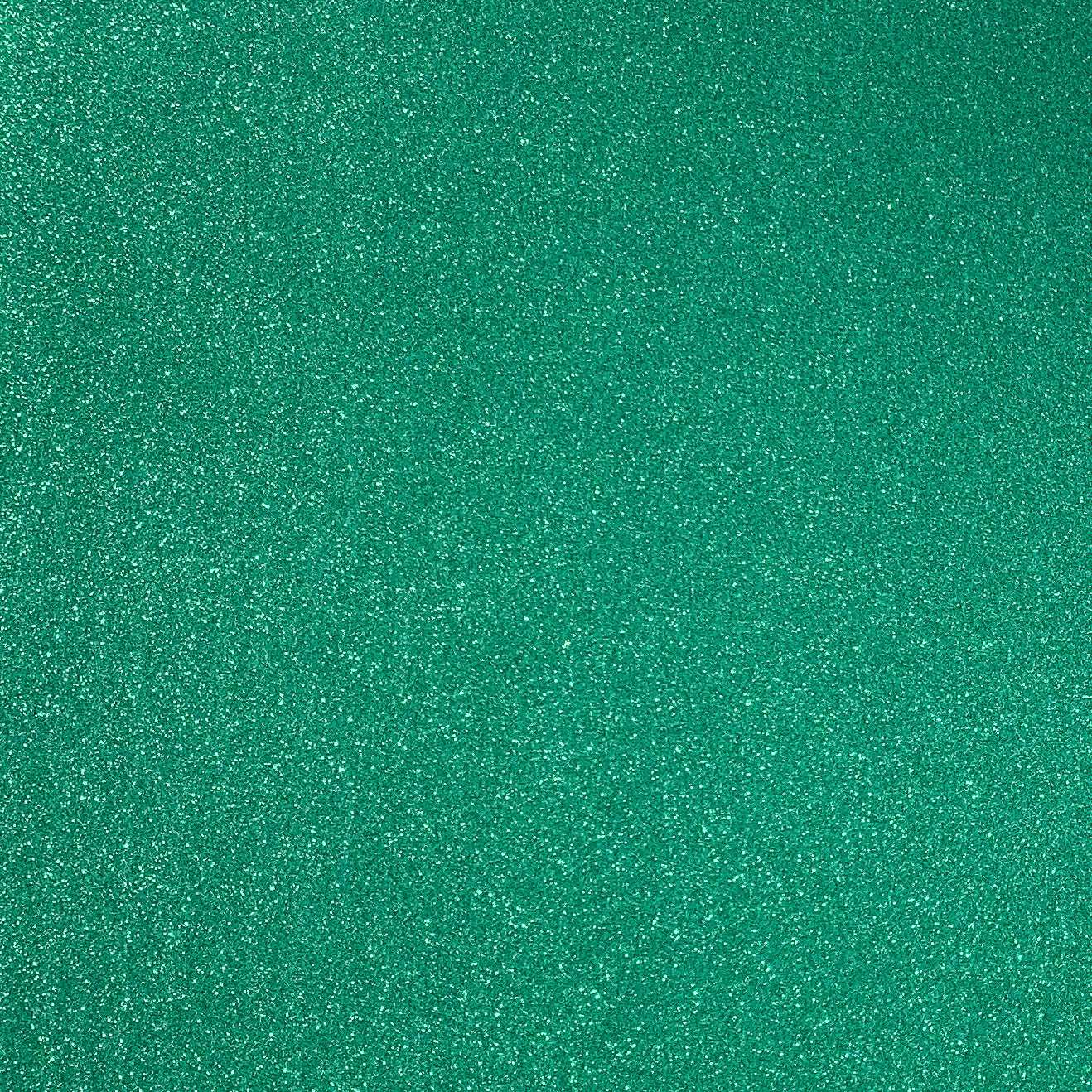 A close-up image of Emerald Green glitter cardstock with a shimmering texture.