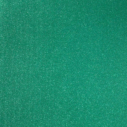 A close-up image of Emerald Green glitter cardstock with a shimmering texture.