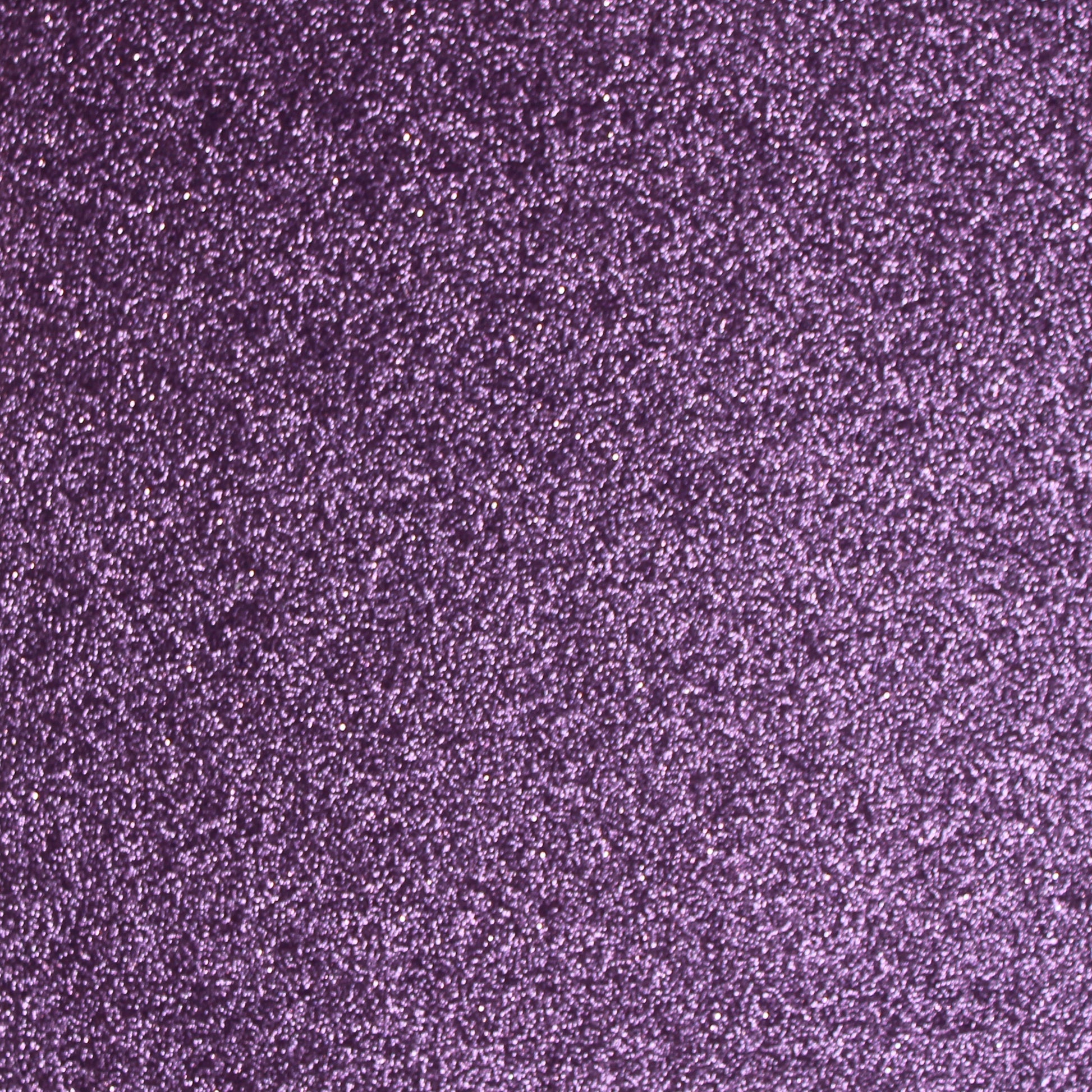 A close-up image of Grape Purple glitter cardstock showing the texture and the shiny surface with white paper backing.