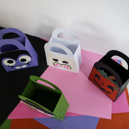 Halloween boo bags opened up showing the interior space for candy and treats