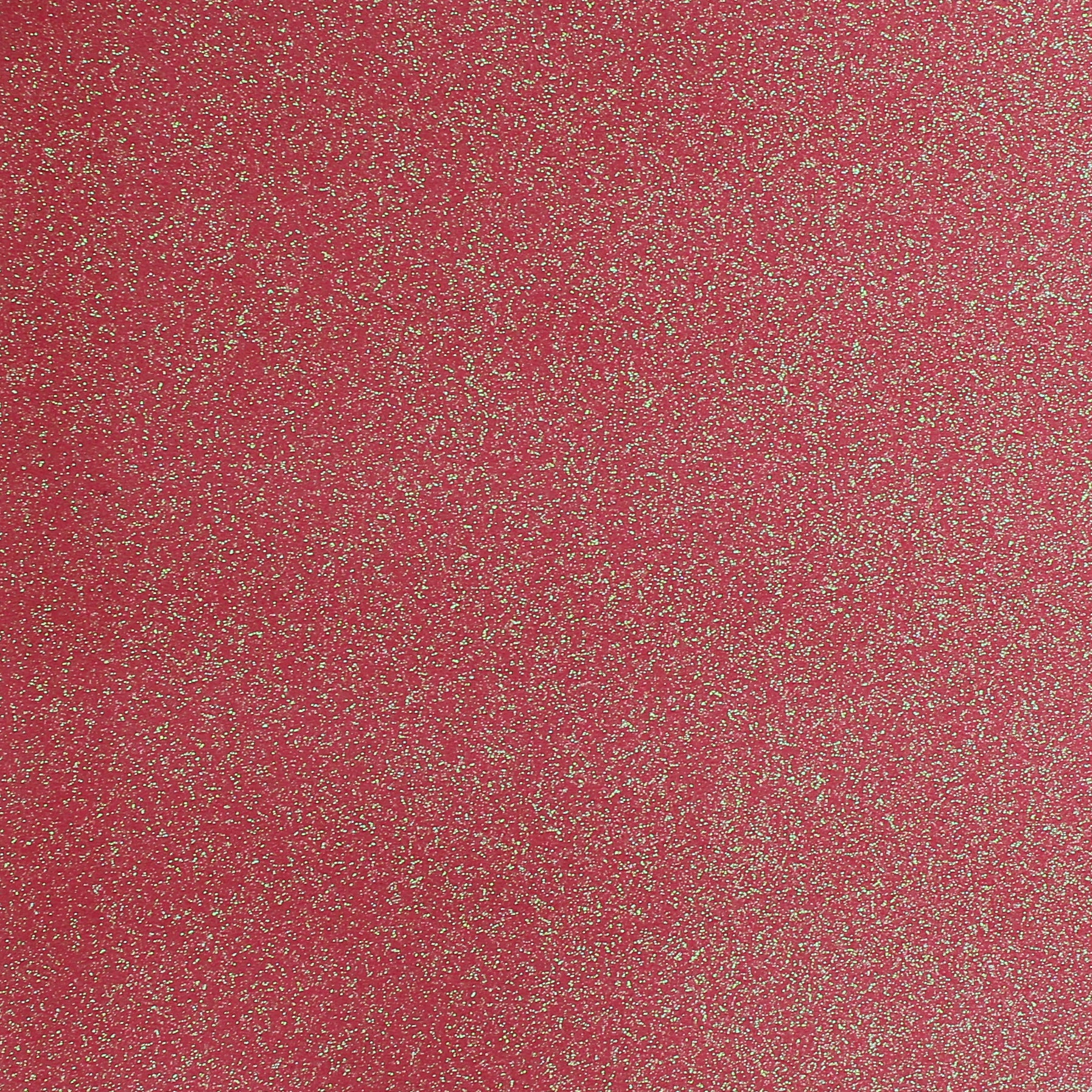 A close-up image of hot pink glitter cardstock with a shimmering texture.
