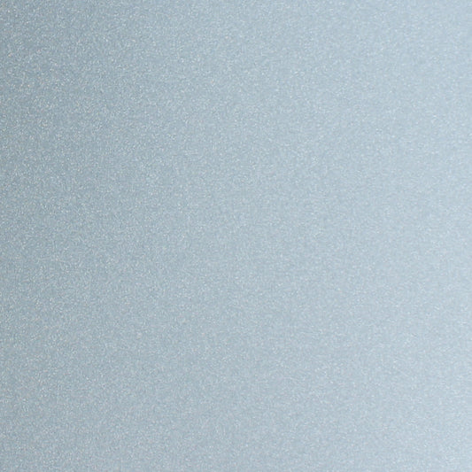 Icy blue glitter cardstock close-up with shimmering sparkle finish