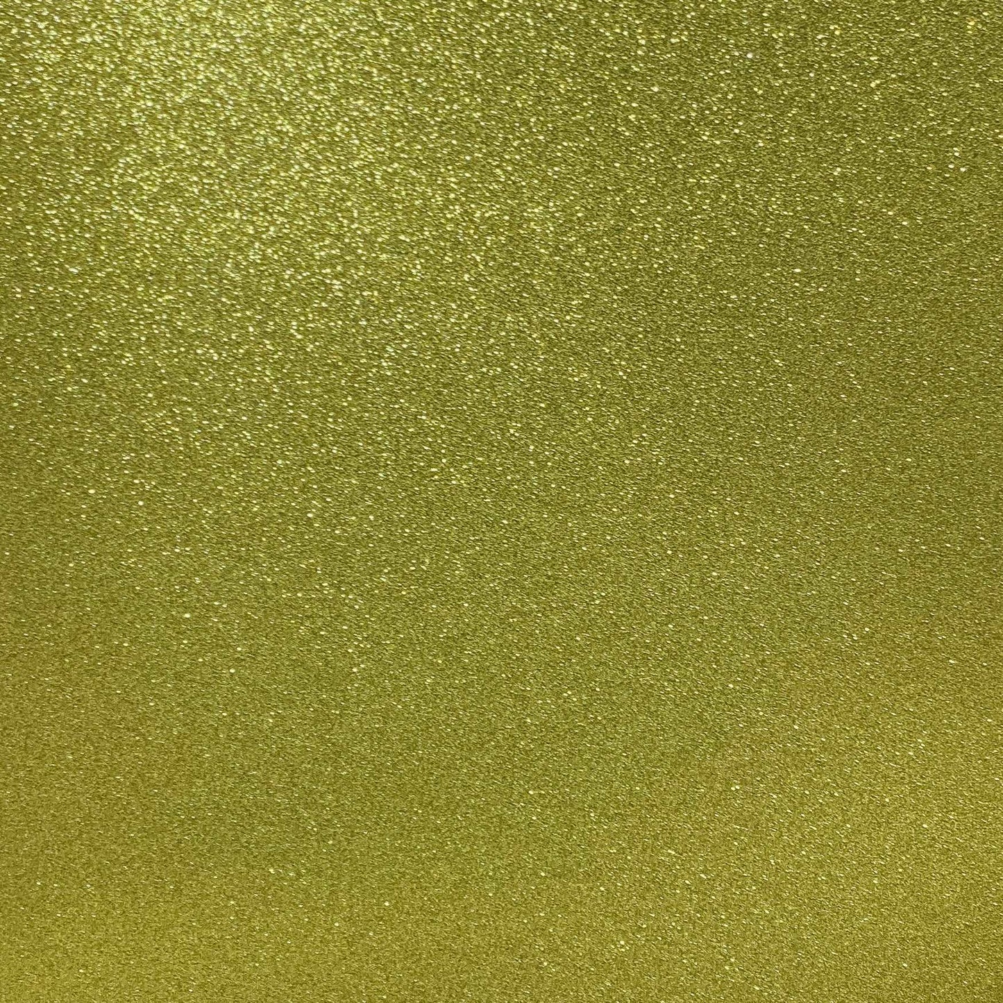 A close-up image of lemon yellow glitter cardstock with a shimmering finish.