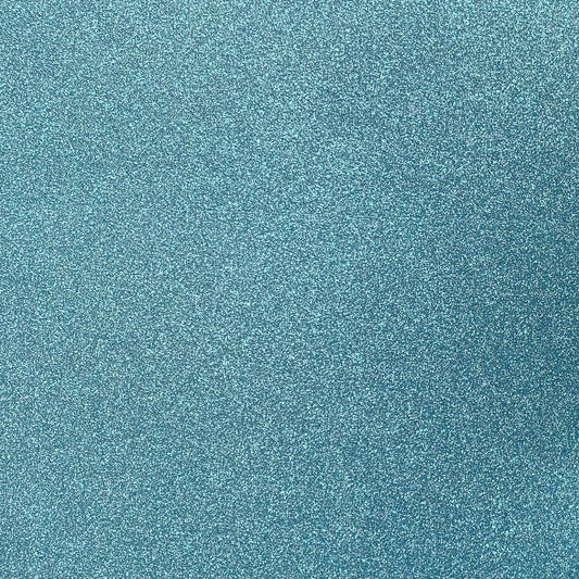 A close-up image of a light blue glitter cardstock paper.