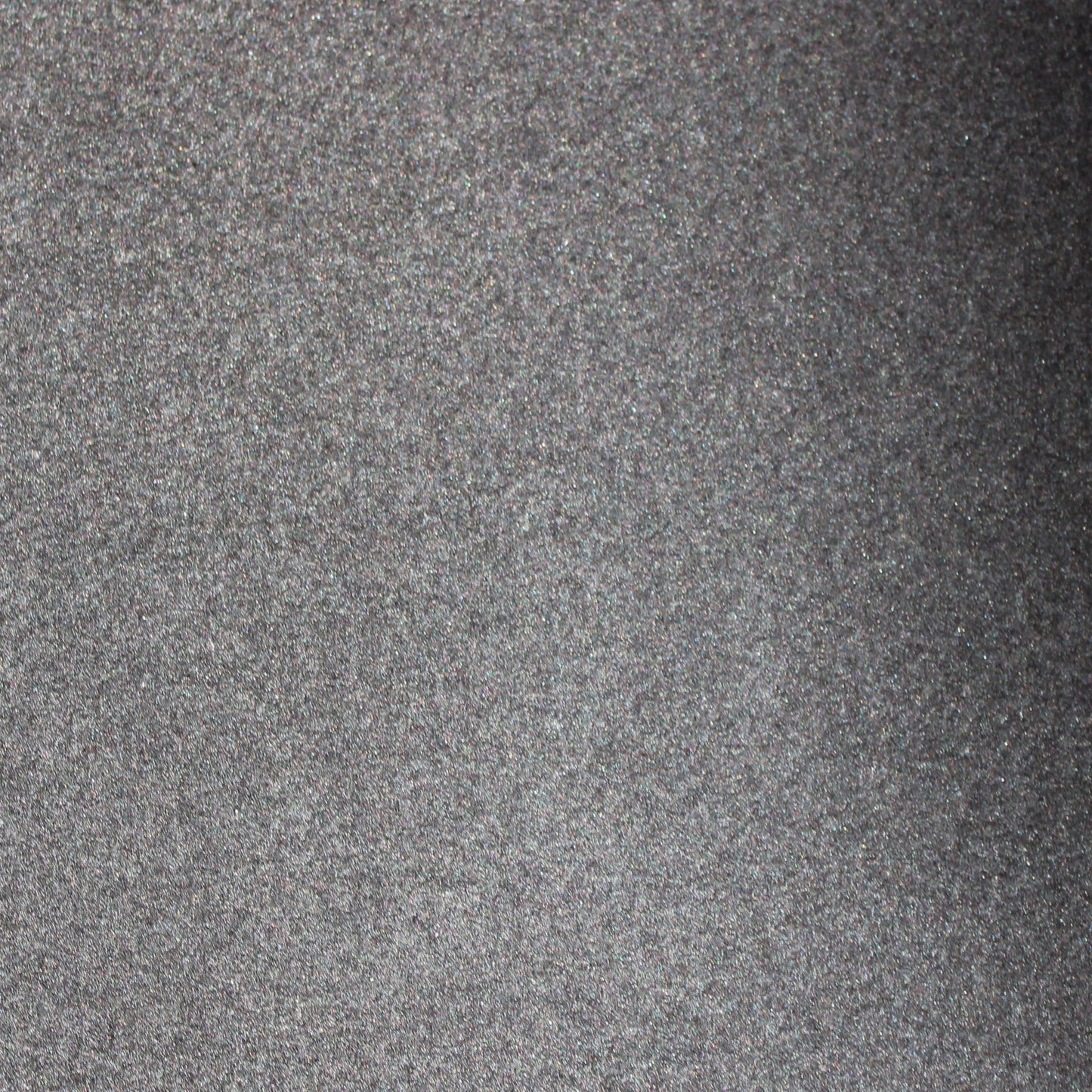 Moonlight black glitter cardstock close-up with silvery charcoal sparkle finish