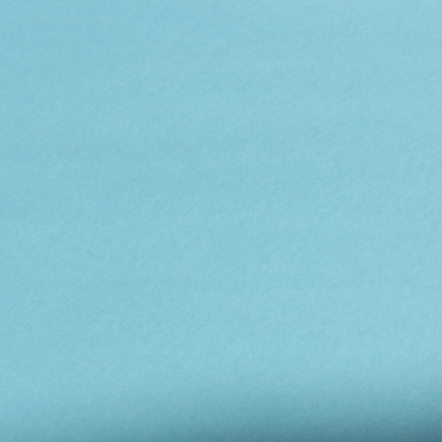 A single sheet of pewter blue cardstock with a smooth finish.