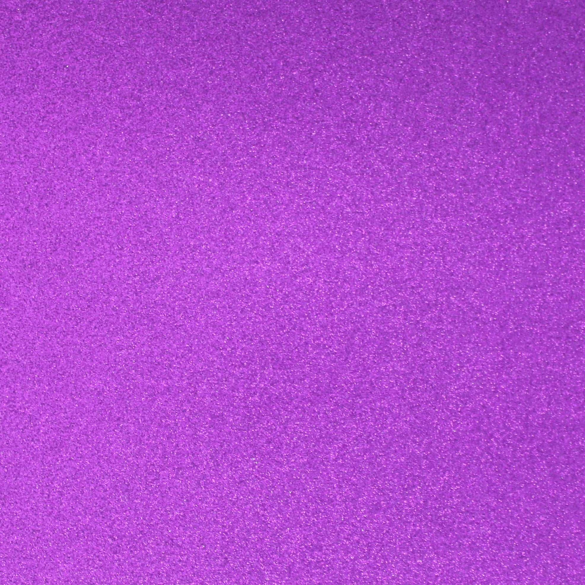 A close-up image of a purple glitter cardstock paper.