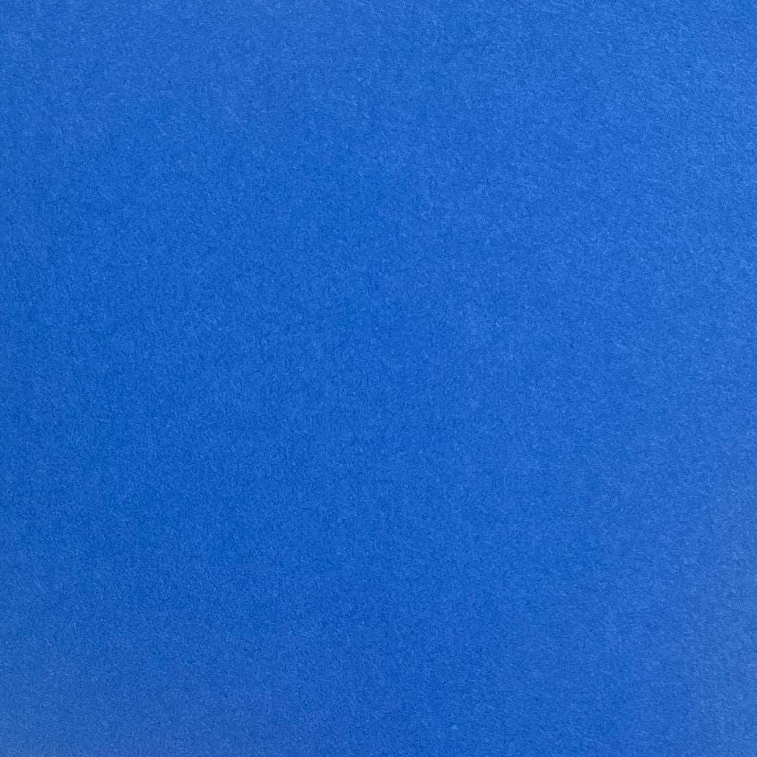 A single sheet of royal blue cardstock paper with a smooth finish.