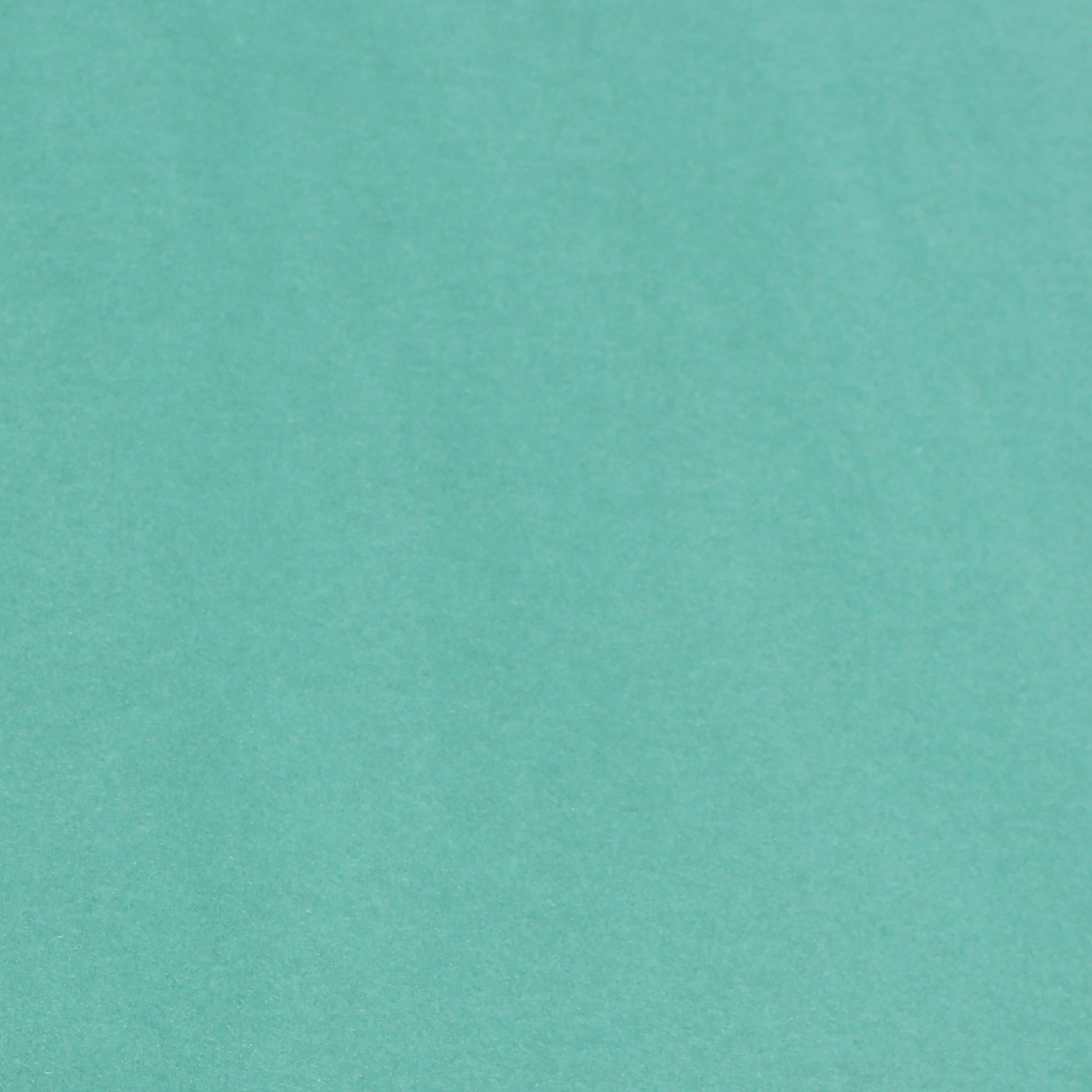 A single sheet of seafoam green cardstock paper with a smooth finish.