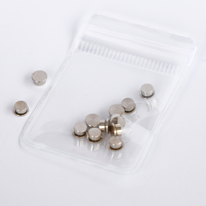 10 pack of silver metal cardstock spinners with a built-in bearing in a clear resealable bag, 5mm top and 4mm base