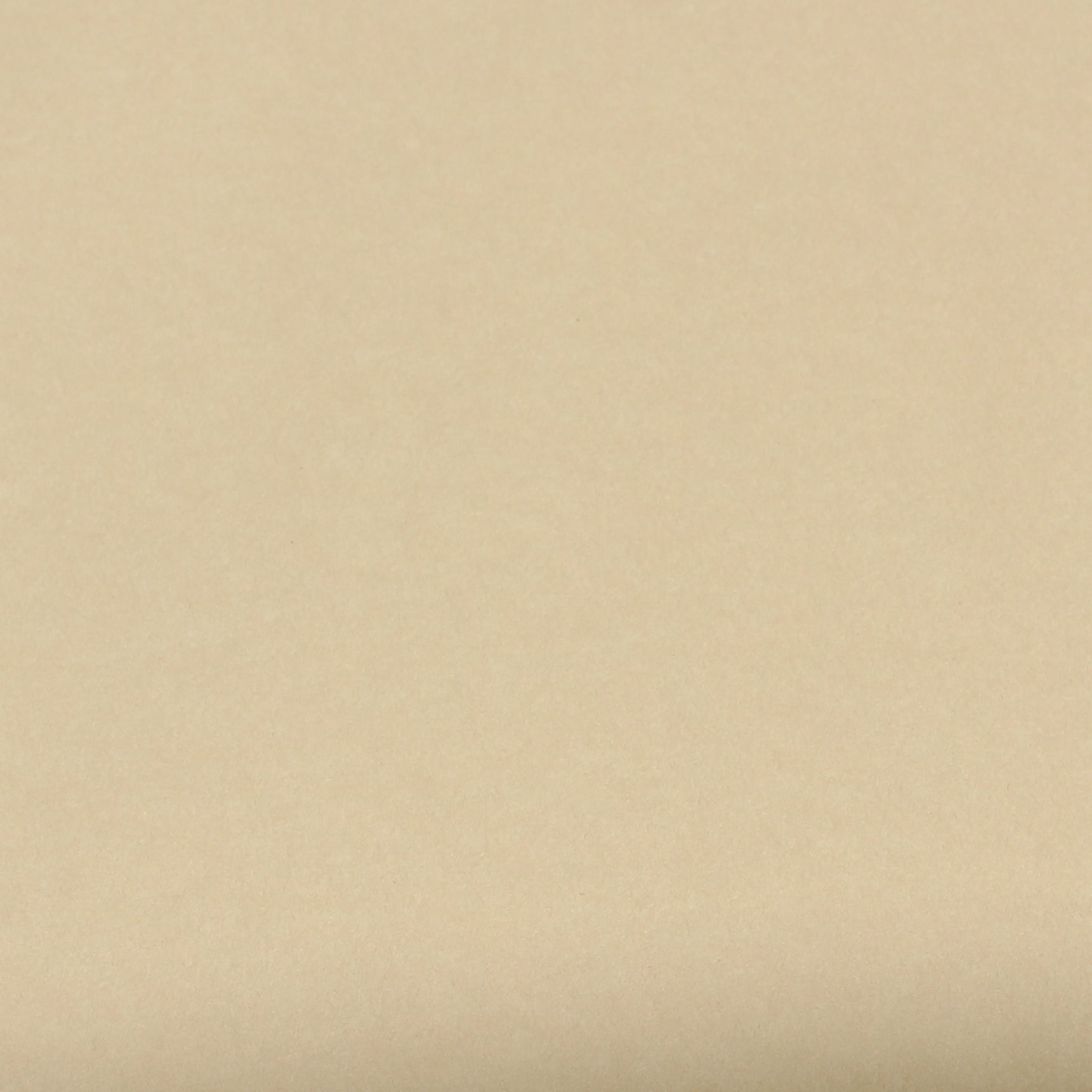 A single sheet of tan brown cardstock paper with a smooth finish.