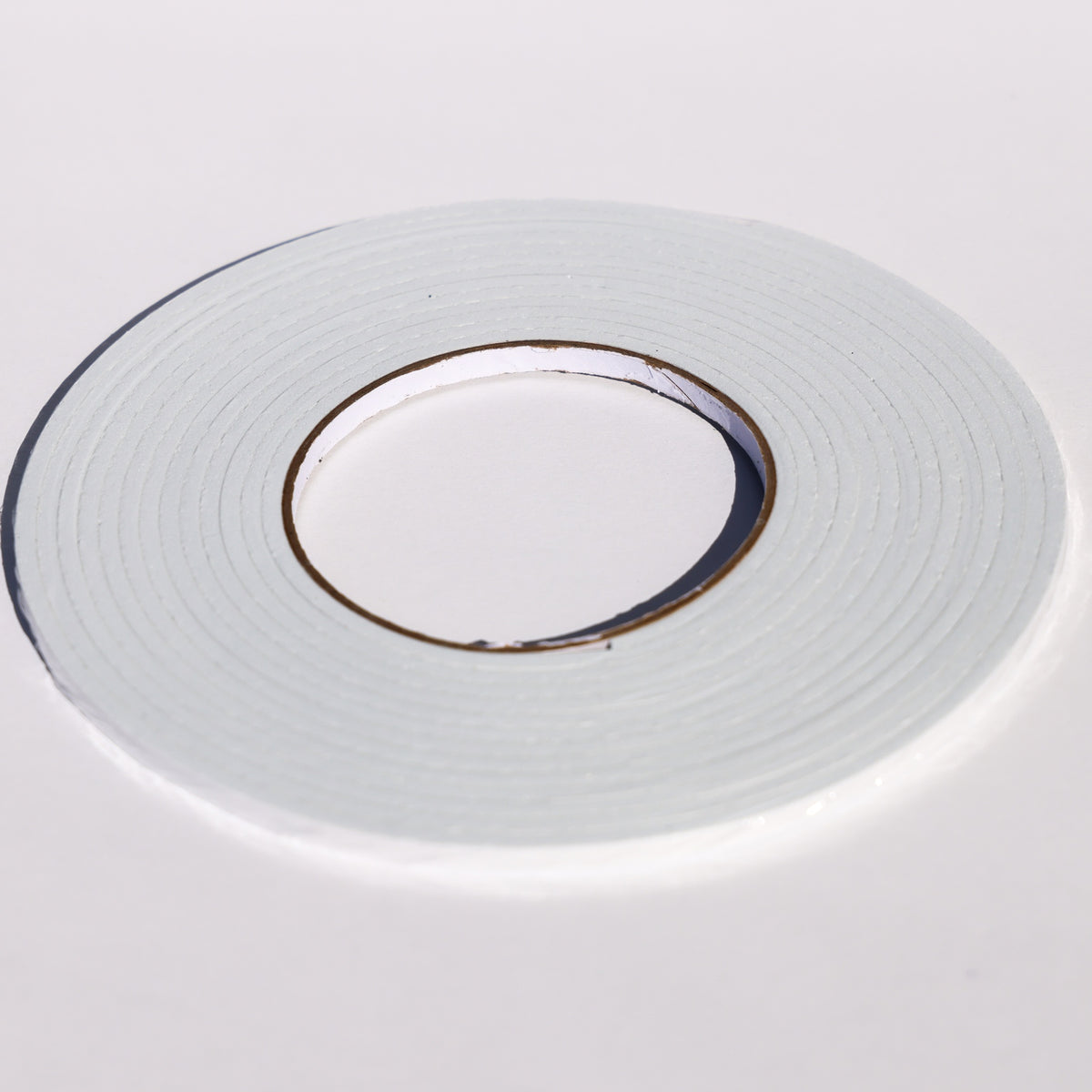 5 meter roll of white foam tape, 3mm thick and 5mm wide, for cardstock crafts