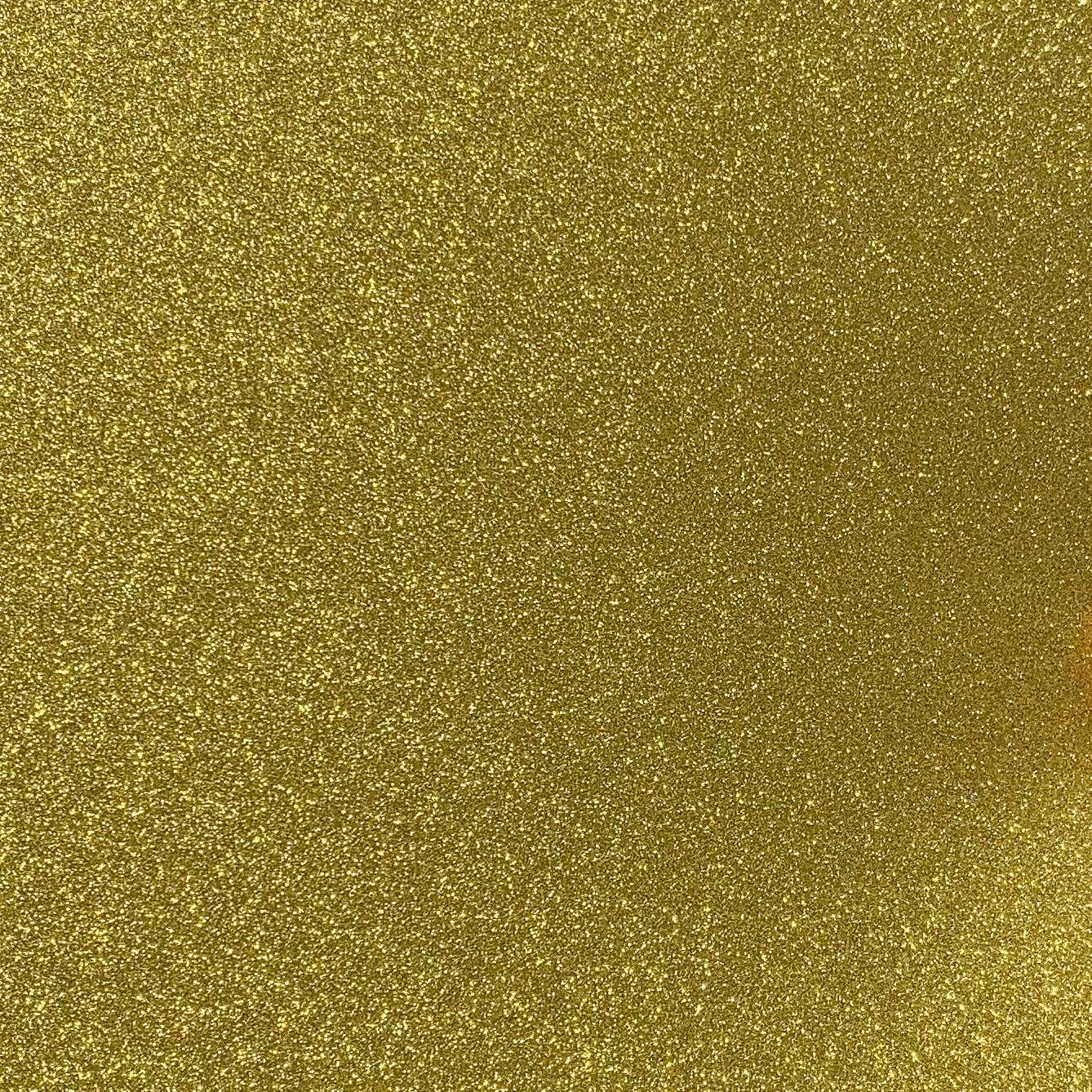 A close-up image of yellow gold glitter cardstock with a shimmering finish.