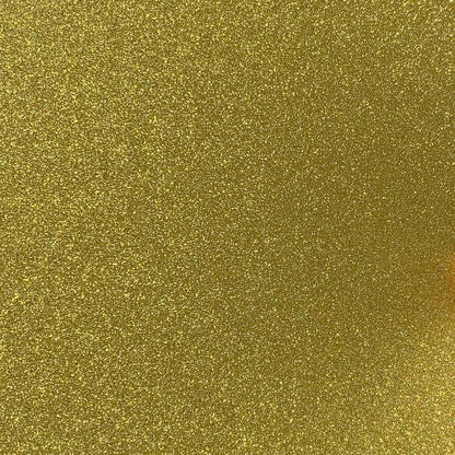 A close-up image of yellow gold glitter cardstock with a shimmering finish.