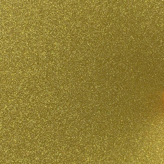 A close-up image of yellow gold glitter cardstock with a shimmering finish.