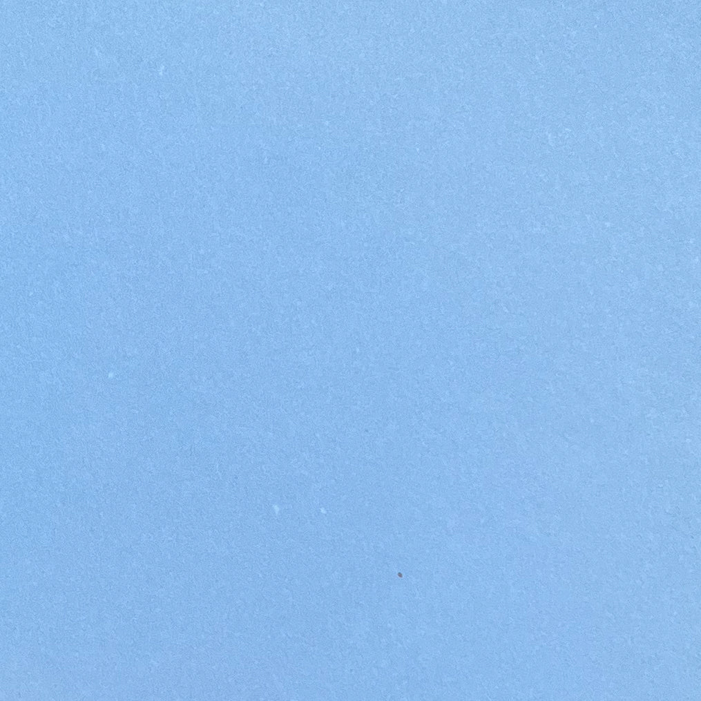 A single sheet of periwinkle blue cardstock paper with a smooth finish.