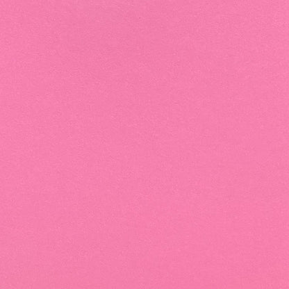 A single sheet of salmon pink cardstock paper.